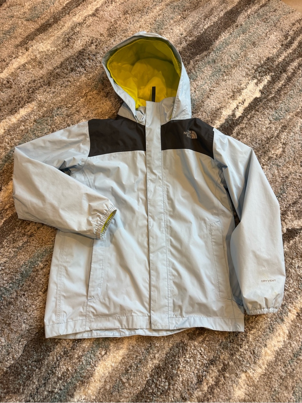 The North Face Light Blue and Black Kids' Hooded Raincoat with Yellow Lining